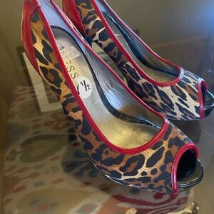 Guess Leopard Print Heels with Red Trim. Gently worn.  Beautiful shoes!